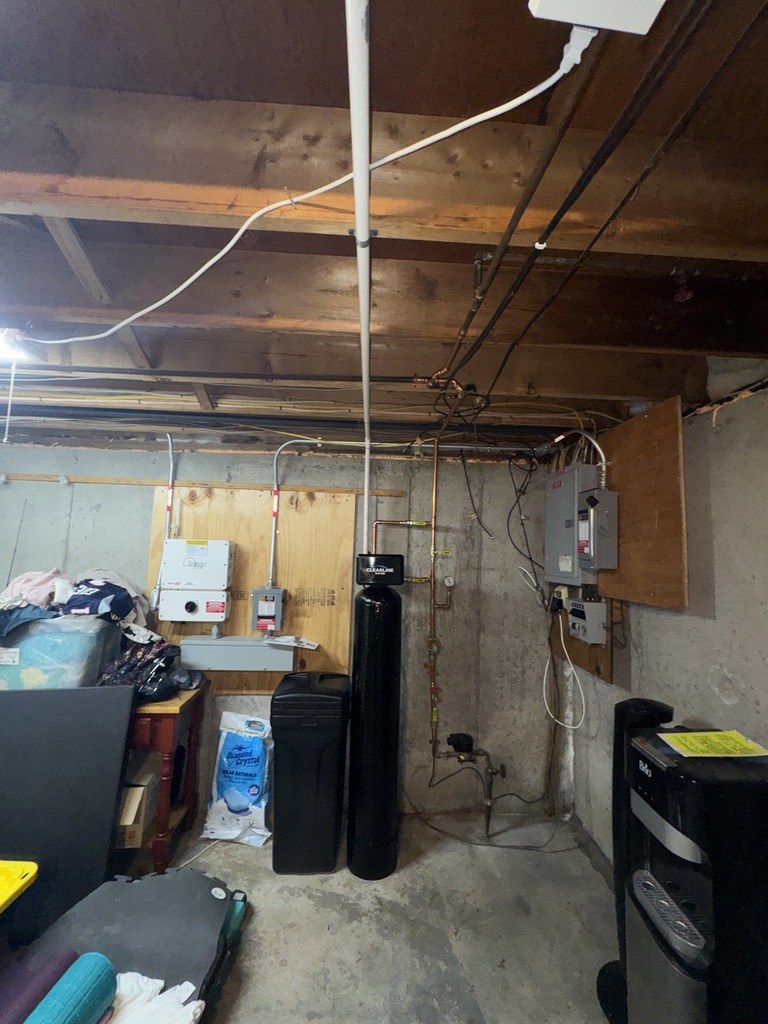 Basement water softener and brine tank