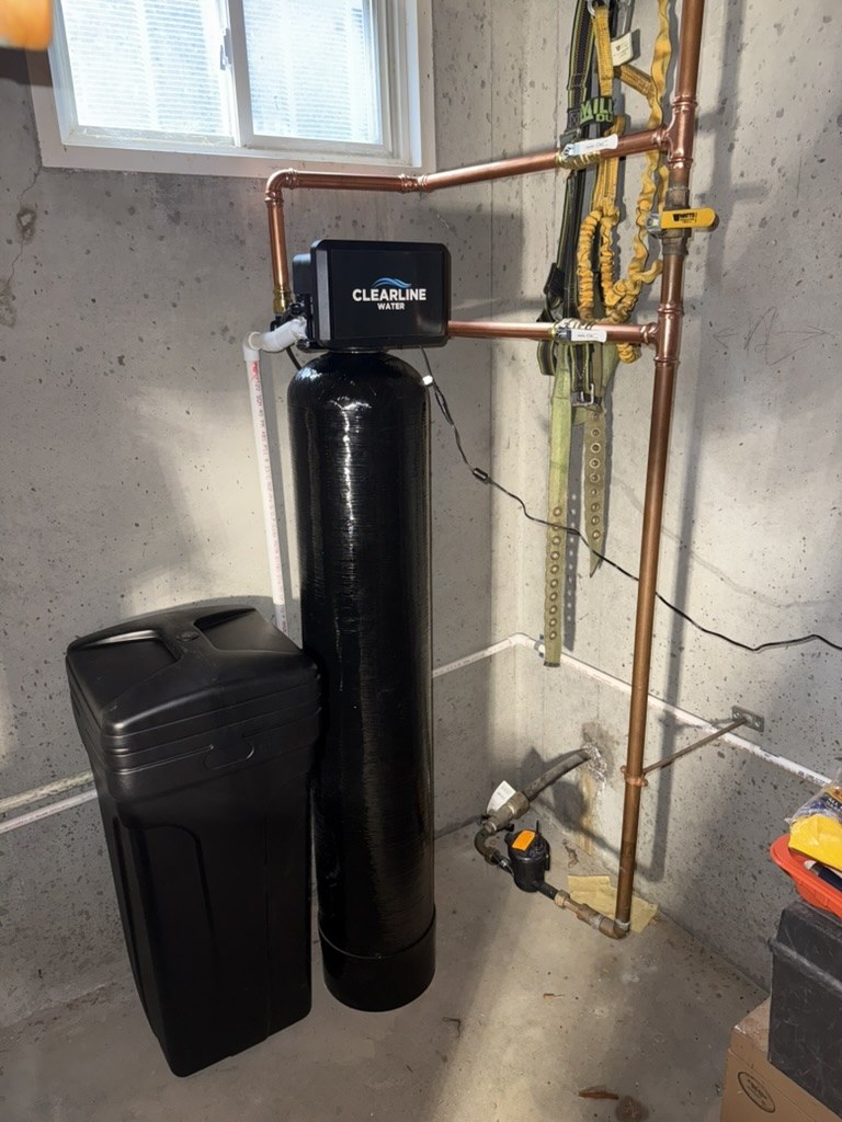 Clearline water softener with brine tank and copper lines